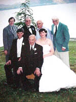Jonathan and Ruth pose with Chapter members - (Front) - Jonathan, his father Henry, and Ruth, (Back) Denis F. Marr, his brother Paul, Harry Taylor, and Duane Booth.  Jonathan's brother, LTC Peter K. Goebel, the Chapter Chaplin, was unable to attend as he is serving in Iraq.