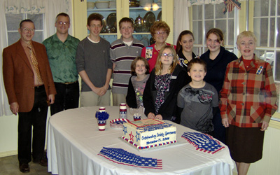 Other adults (Karl, Rich, Johanna, and Eleanor) being honored with C.A.R. youth and the celebratory cake