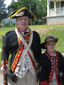 Saratoga Battle Chapter Treasurer Mike Companion with son Andrew.  Both are re-enactors with the 2nd Continental Artillery.
