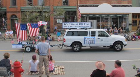 The SAR float passes the reviewing stand