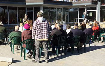 Park Ranger Bill Valosin at the podium