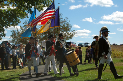 Re-enactors present colors under the command of General Gates - Photo: Joyce Armstrong