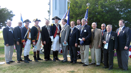 Post Ceremony SAR Member Photo (l-r) Tim Mabee, Duane Booth, Bret Trufant, Mike Companion, Karl Danniel, Peter Goebel, Dennis Marr, Richard Sage, Tivo Africa, Phil Williams, John Sheaff, Pat Festa, Tom Dunne, & Hans Jackson - Photo: Duane Booth