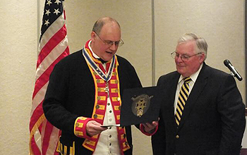 President Galant presenting the Military Service award to 1st Vice President Patrick Reilly