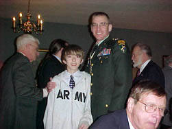 Son Joshua stands with Dad, Chaplain and Past President LTC Peter K. Goebel. Member James "Jim" T. Hays is in right rear of the picture and long time SAR member (12/19/1969) Noel Haskell is pictured in the foreground.  Joshua led the Pledge of Allegiance for us at the start of the meeting  - Thank you Joshua.