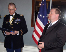 LTC Peter Goebel and Captain Brian Van De Wall, who receives his award for service in Iraq - Photo by Duane Booth