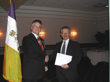 President Rich Fullam congratulates and welcomes Bob Brownell to the Chapter (photo courtesy of Dianne Fullam)