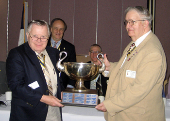 Chapter President and Registrar Thomas L. Dunne (l) receives the Addams Cup from Society Registrar William J. Woodworth