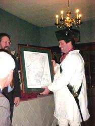 Rick presents speaker Karl Crannel with Revolutionary War era map of Saratoga.