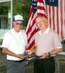Chapter member Dennis Gill Booth (on right) is presented the Meritorious Service Award by Duane Booth, President of the Saratoga Battle Chapter.  Dennis' wife, Colleen Booth received the Martha Washington Medal in absentia for her work on the Chapter website graphics.