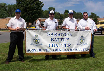 Preparing the Chapter banner - (L-R) Dennis Booth, George Ballard, Duane Booth, Ray LeMay